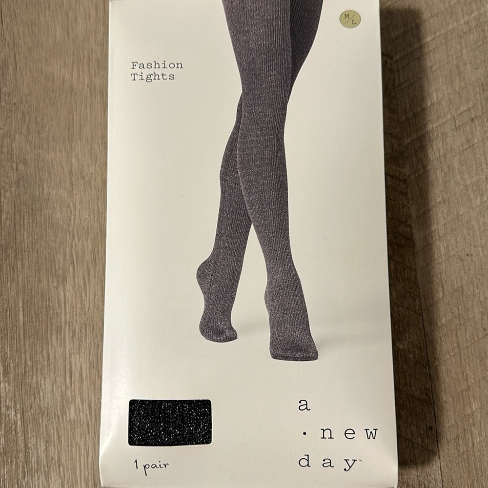 New in the sealed package fashion tights M/L